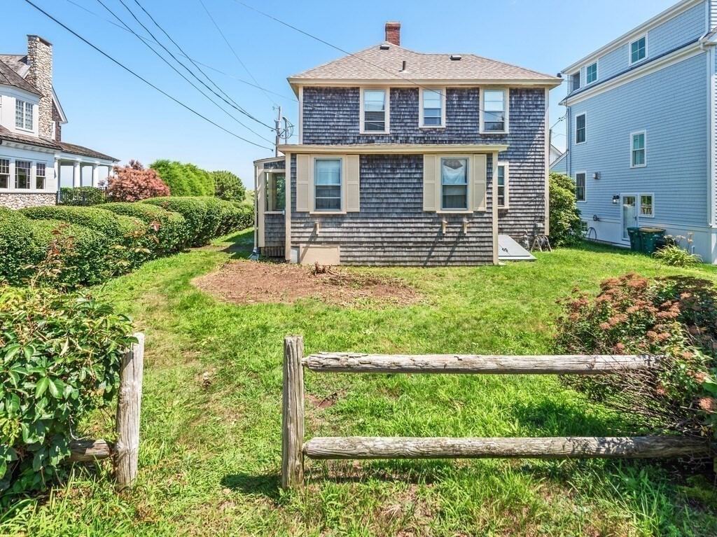 2 Collier Road Scituate, MA 02066 - Photo 12 of 41 a front view of a house with a yard