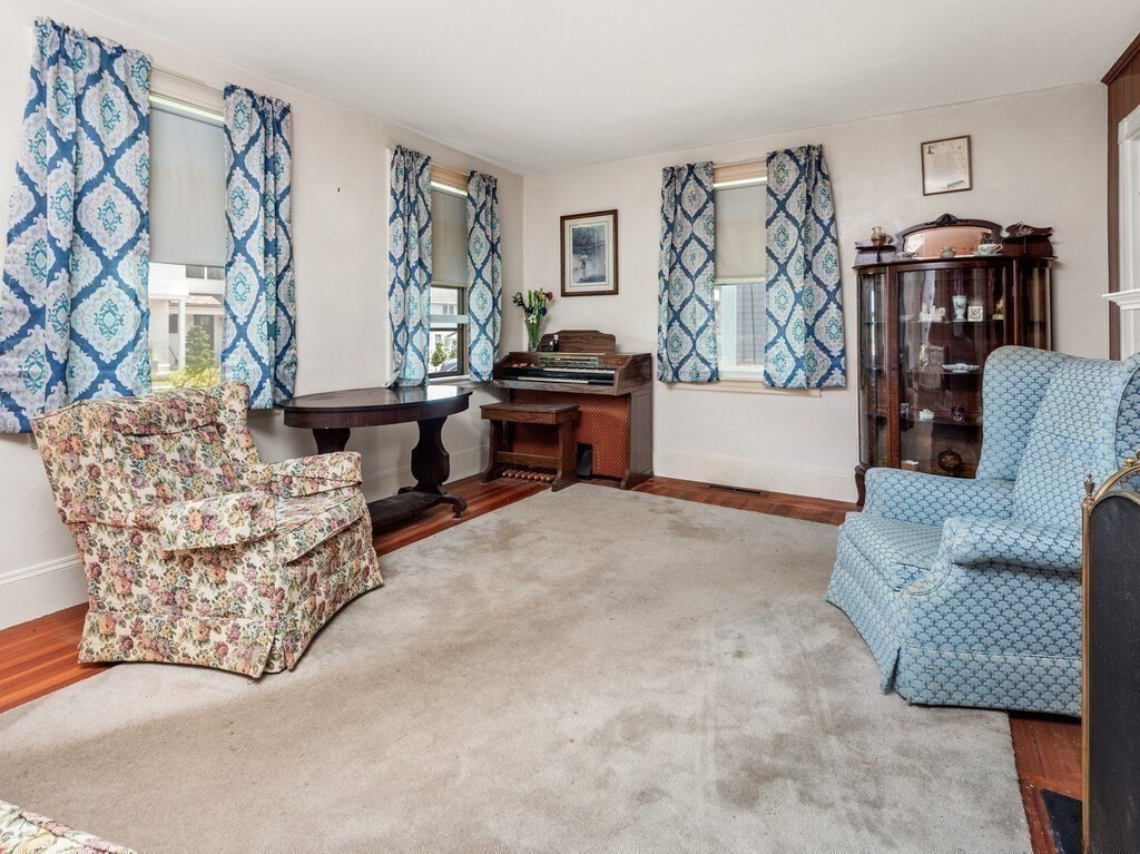 2 Collier Road Scituate, MA 02066 - Photo 26 of 41 a living room with furniture and a couch