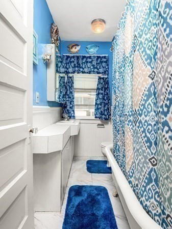 2 Collier Road Scituate, MA 02066 - Photo 27 of 41 a bathroom with a sink and a bathtub