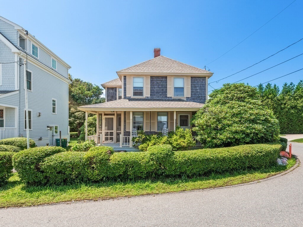 2 Collier Road Scituate, MA 02066 - Photo 3 of 41 a front view of a house with a garden