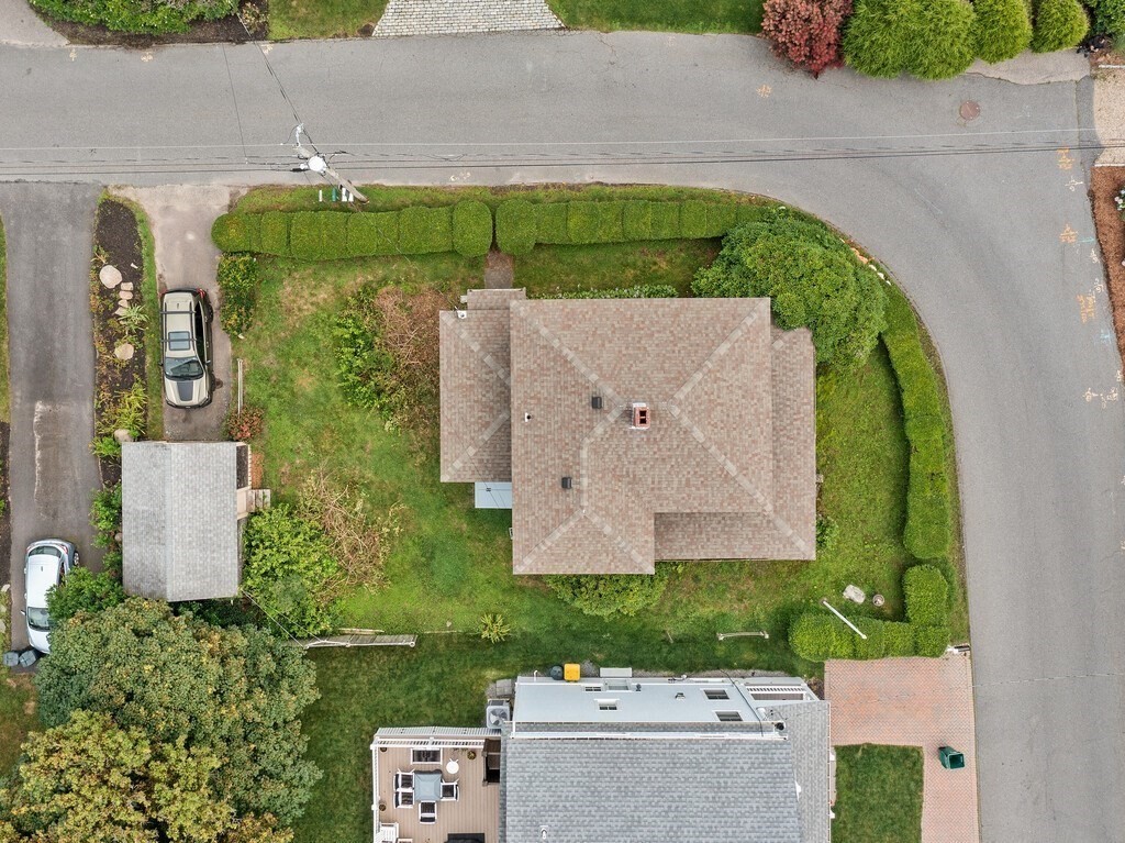 2 Collier Road Scituate, MA 02066 - Photo 41 of 41 an aerial view of a house with a garden and a car parked