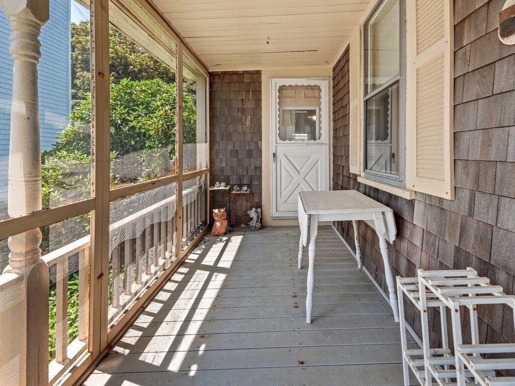 2 Collier Road Scituate, MA 02066 - Photo 8 of 41 a view of a balcony with chairs