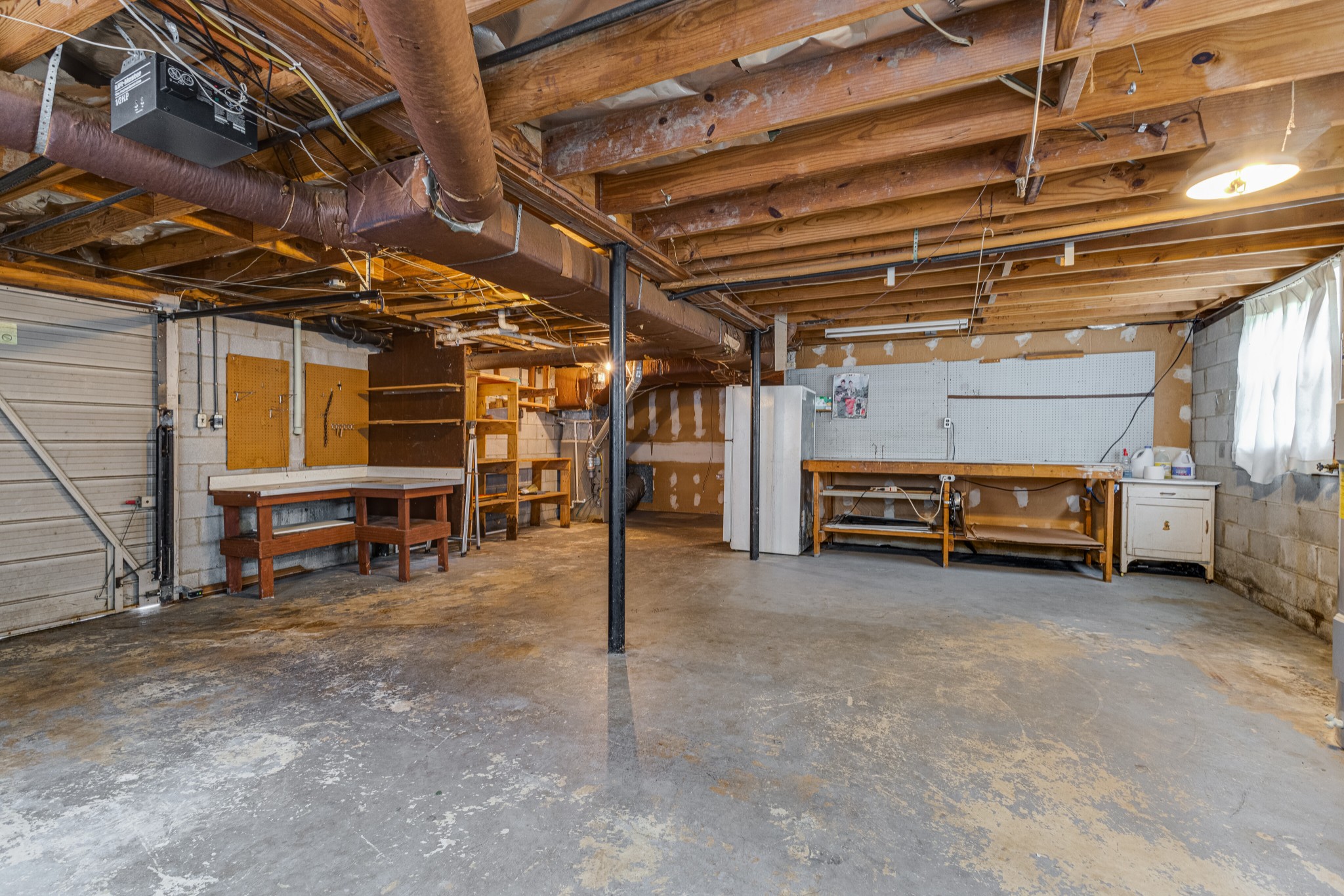 76 Tusculum Road Antioch, TN 37013 - Photo 27 of 33 a view of a garage room with racks