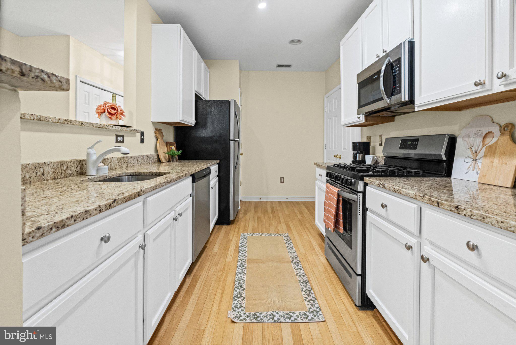 36 Hawk Rise Lane, Unit 104 Owings Mills, MD 21117 - Photo 4 of 25 Modern kitchen with sleek finishes.