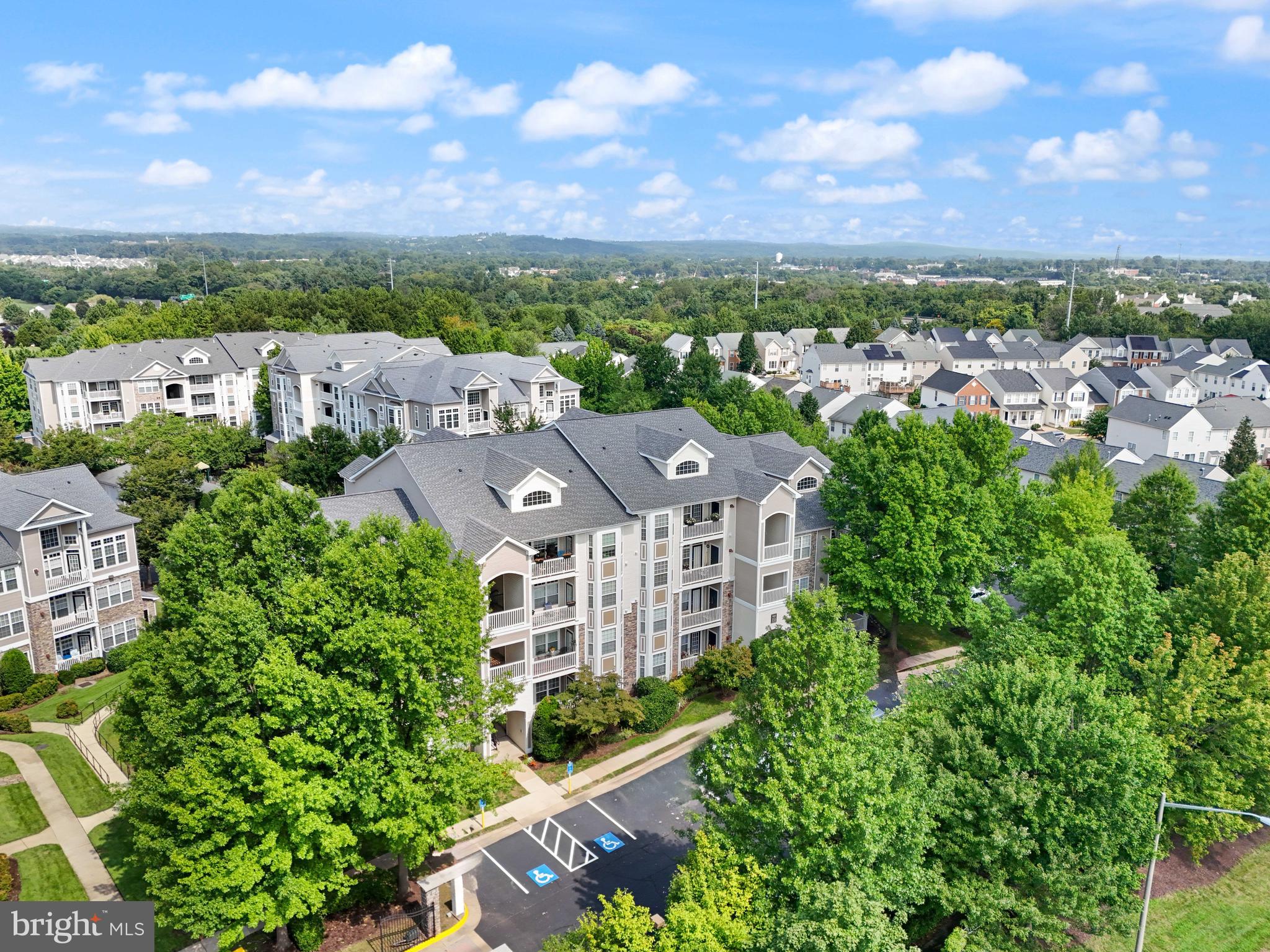 502 Sunset View Terrace Southeast, Unit 107 Leesburg, VA 20175 - Photo 32 of 50 an aerial view of multiple house