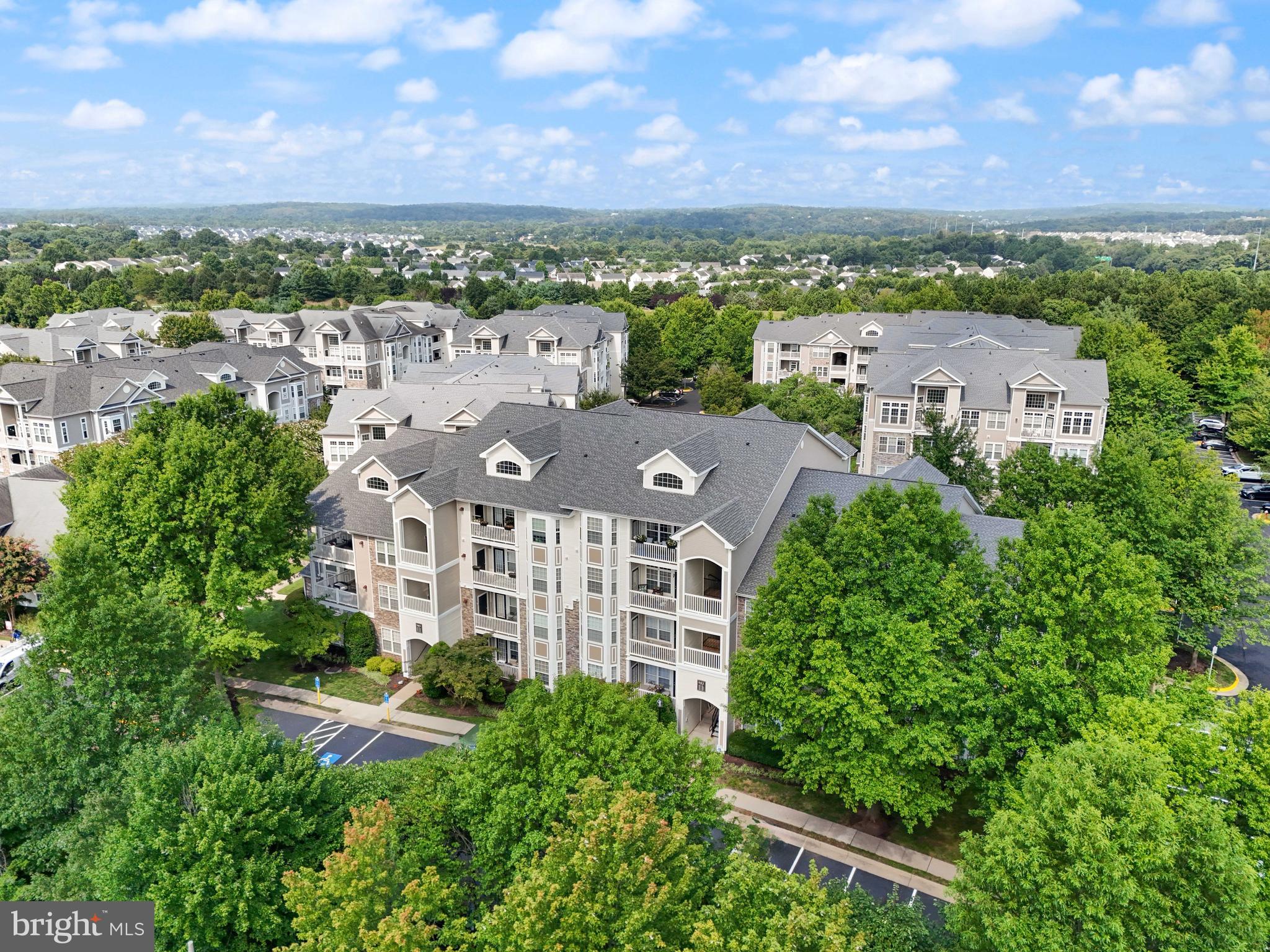 502 Sunset View Terrace Southeast, Unit 107 Leesburg, VA 20175 - Photo 33 of 50 an aerial view of multiple house