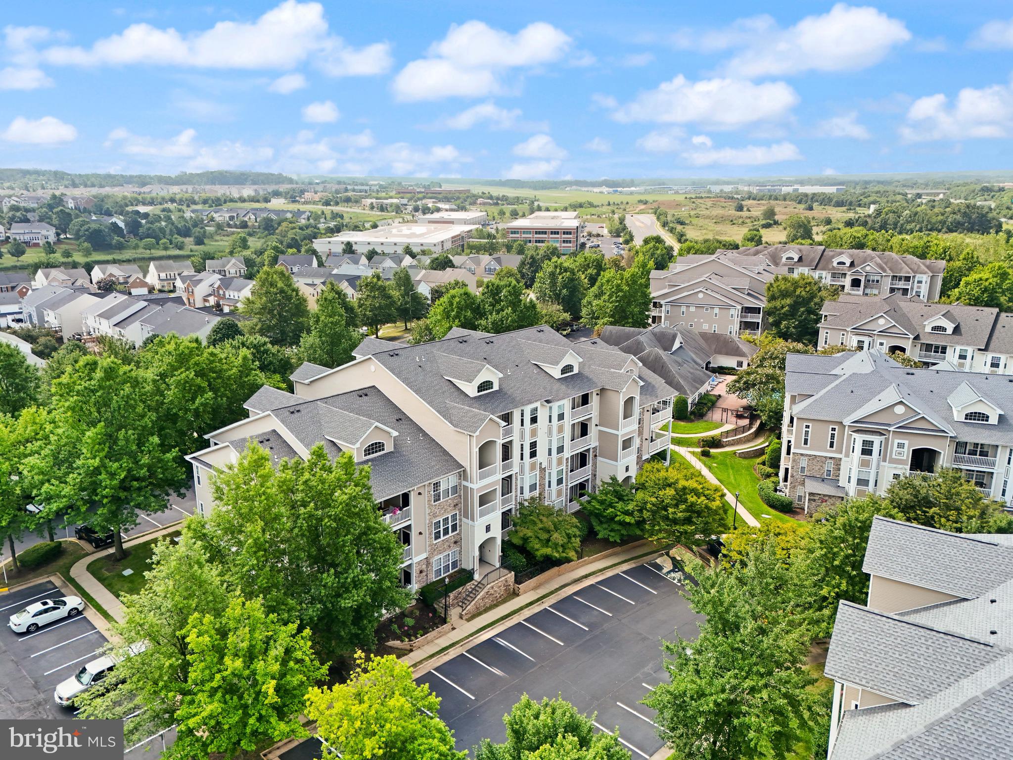 502 Sunset View Terrace Southeast, Unit 107 Leesburg, VA 20175 - Photo 34 of 50 an aerial view of multiple house
