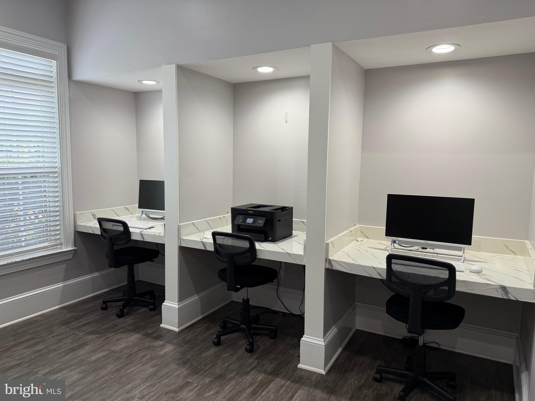502 Sunset View Terrace Southeast, Unit 107 Leesburg, VA 20175 - Photo 50 of 50 a view of a workspace with furniture and a window