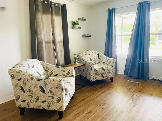 a bedroom with bed and window