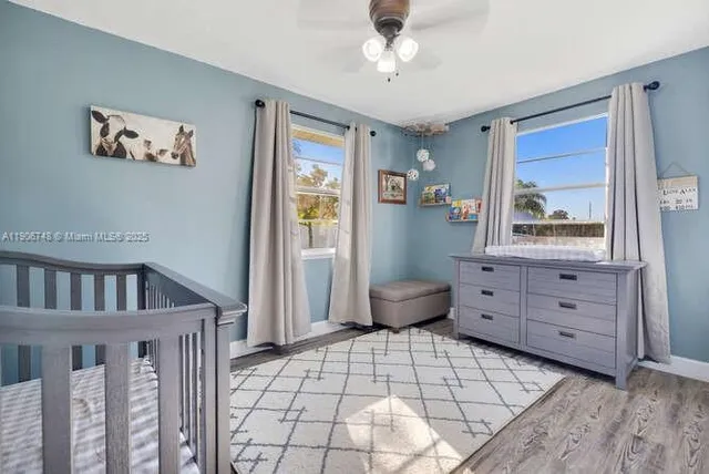 a room that has a bed and a window