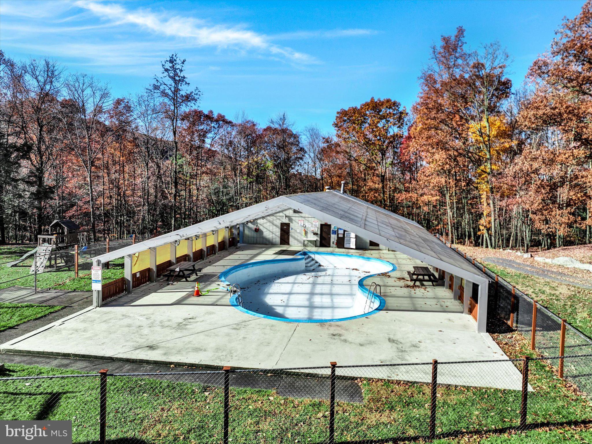 116 Spring Mountain Drive Zion Grove, PA 17985 - Photo 16 of 18 a view of a swimming pool with a balcony
