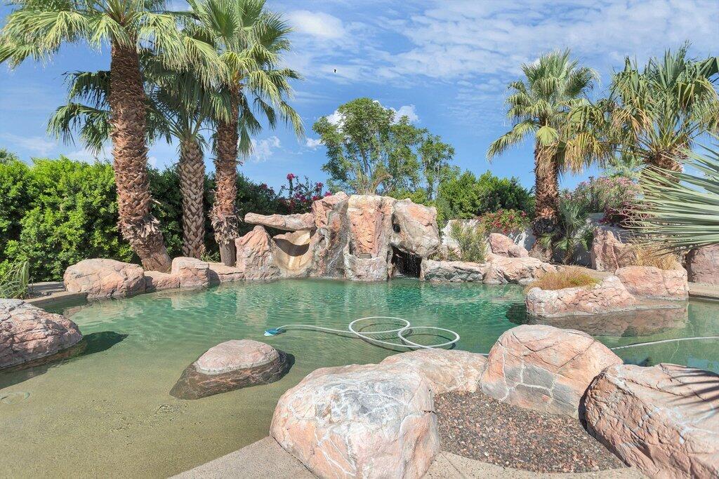 8 MacBeth Court Rancho Mirage, CA 92270 - Photo 33 of 46 a backyard of a house with outdoor seating