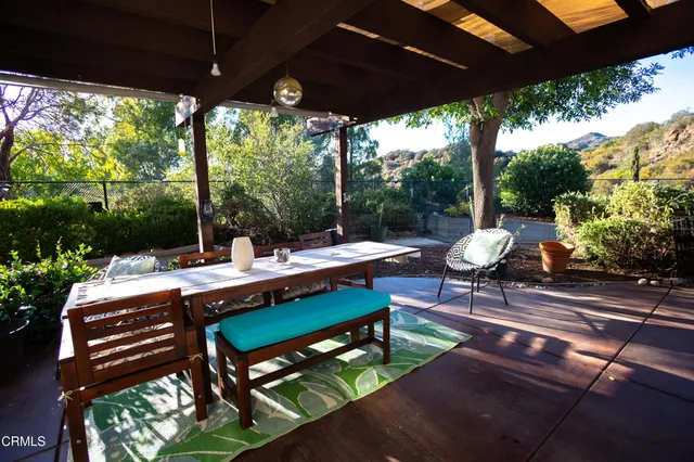 a view of a living room with windows
