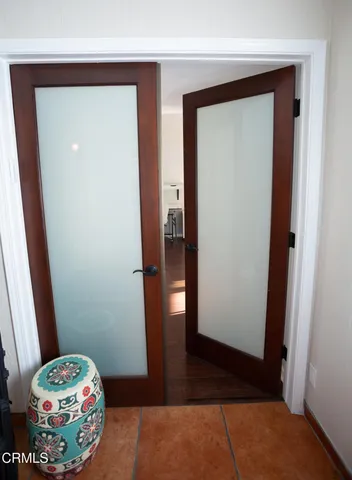 a bathroom with a double vanity sink and mirror