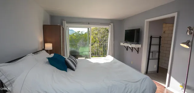 a bathroom with a shower and toilet