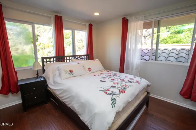 a view of a patio with table and chairs and potted plants