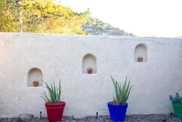 a kitchen with a sink stove and microwave