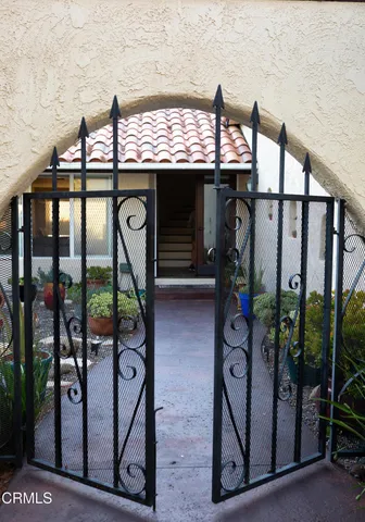 a view of a floor to ceiling window and a sink