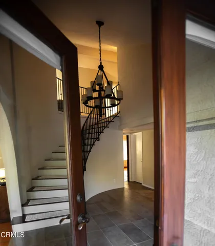 a stove top oven sitting inside of a kitchen