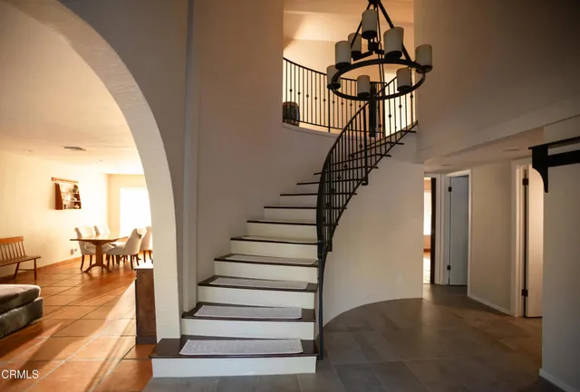 a kitchen with stainless steel appliances granite countertop a stove and a microwave