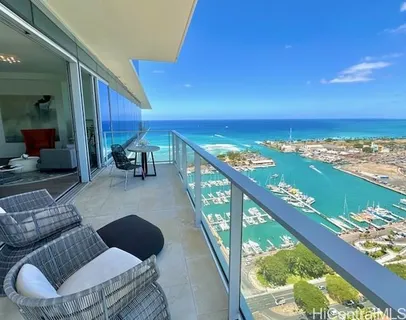 a balcony with an ocean view