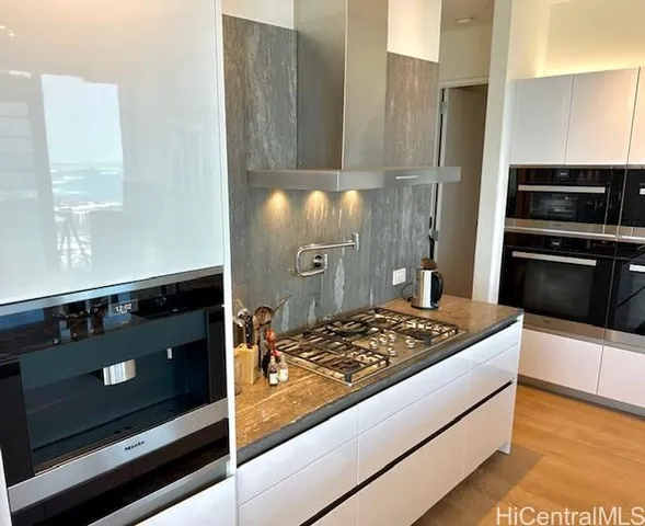 a bathroom with a tub and shower