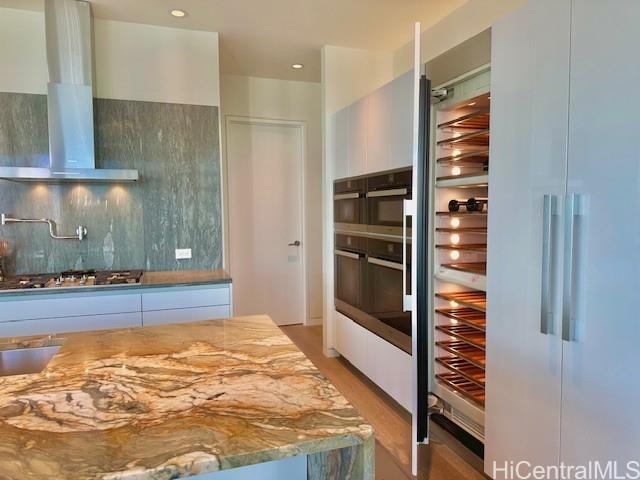 1118 Ala Moana Boulevard, Unit 3403 Honolulu, HI 96814 - Photo 21 of 24 a bathroom with a tub and shower