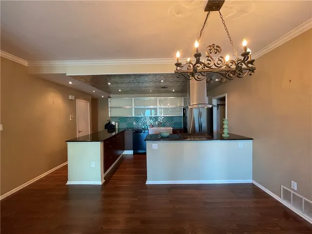 a view of a living room with furniture