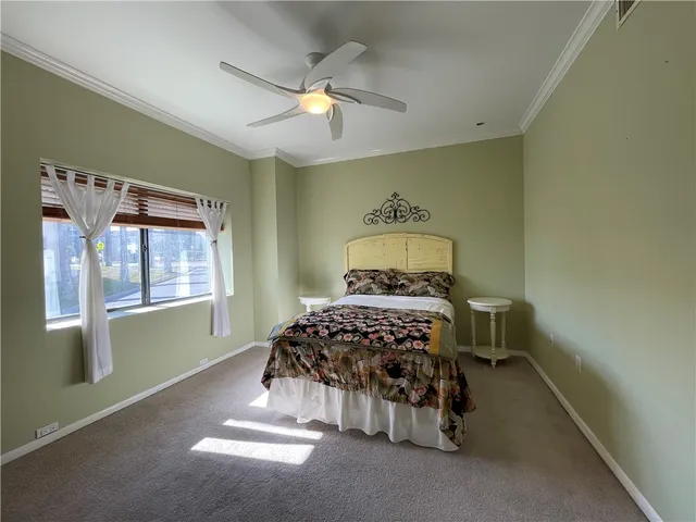 a bathroom with a granite countertop sink toilet a mirror and shower