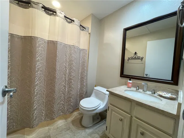 an empty room with fan