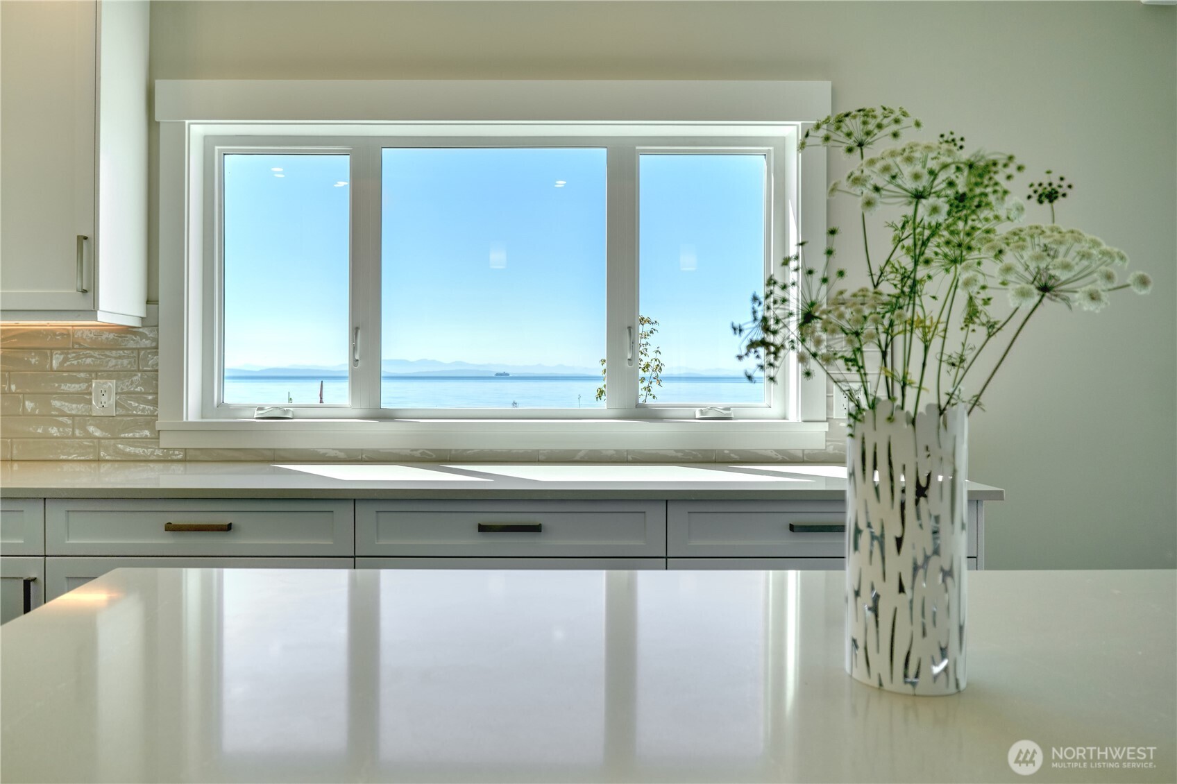 631 Freemans Lane Point Roberts, WA 98281 - Photo 15 of 40 a sink with a window