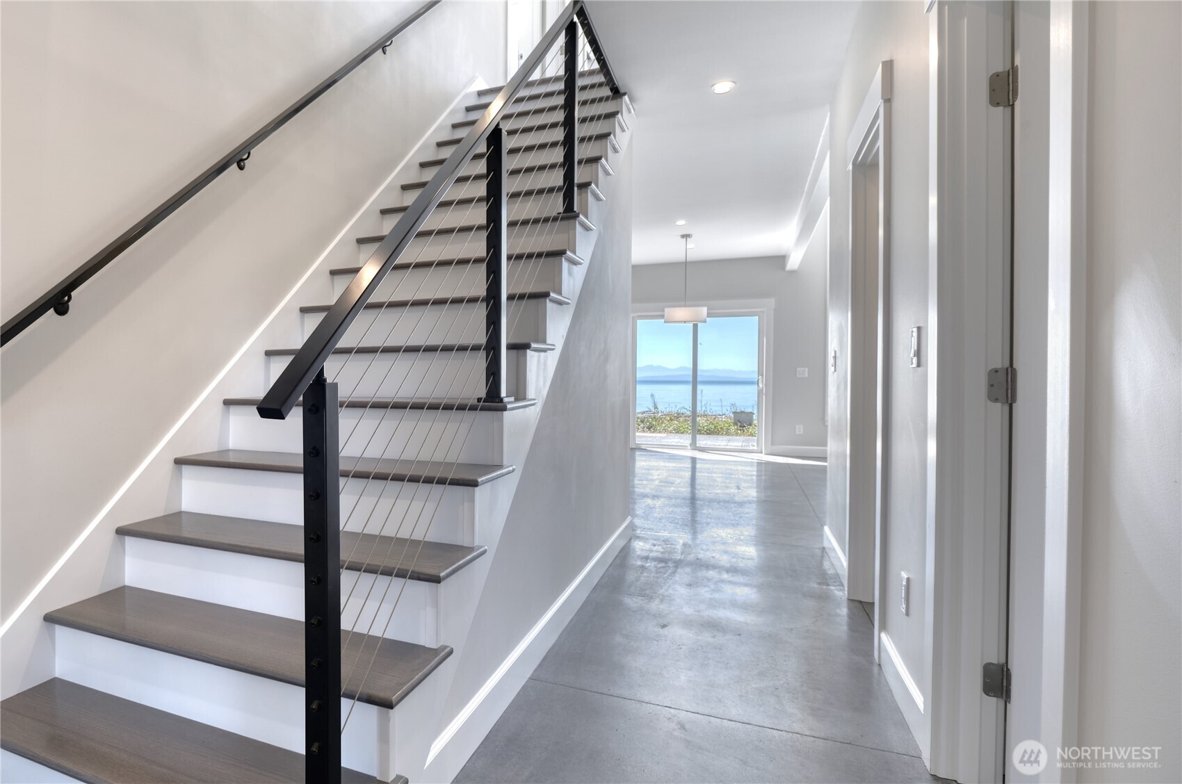 631 Freemans Lane Point Roberts, WA 98281 - Photo 17 of 40 a view of entryway and hall with wooden floor