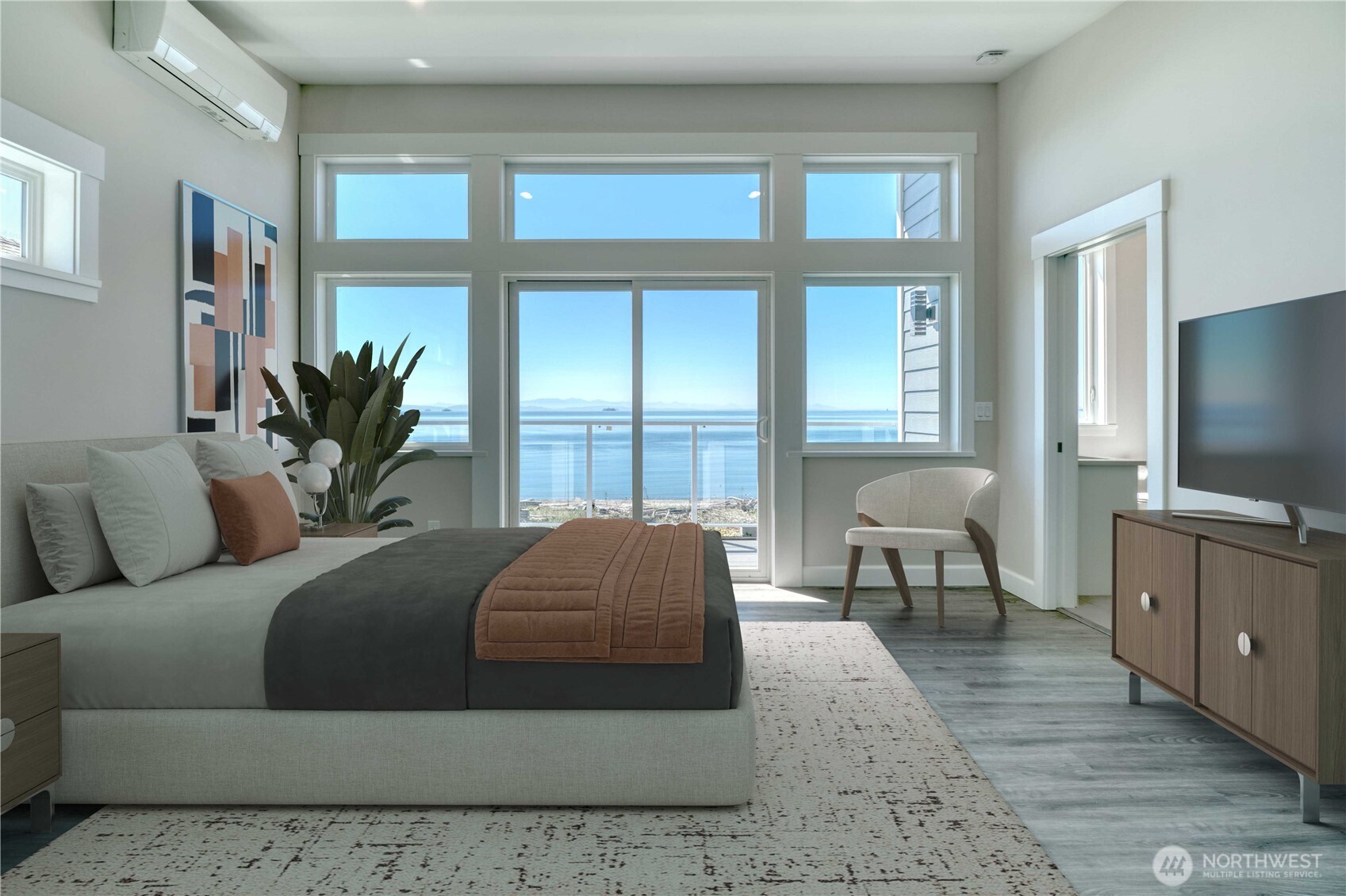 631 Freemans Lane Point Roberts, WA 98281 - Photo 18 of 40 a living room with a bed furniture flat screen tv and a large window