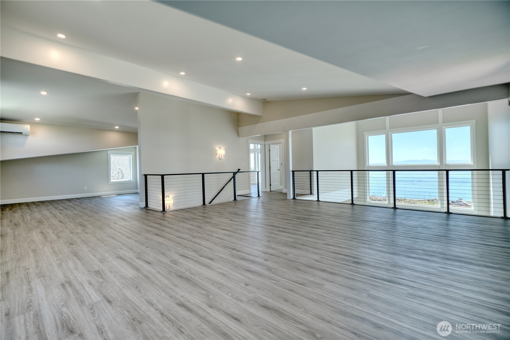 631 Freemans Lane Point Roberts, WA 98281 - Photo 26 of 40 a view of an empty room with wooden floor