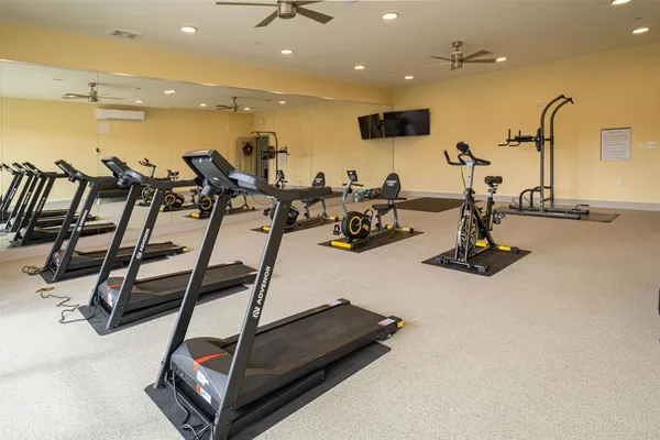 a view of a room with gym equipment