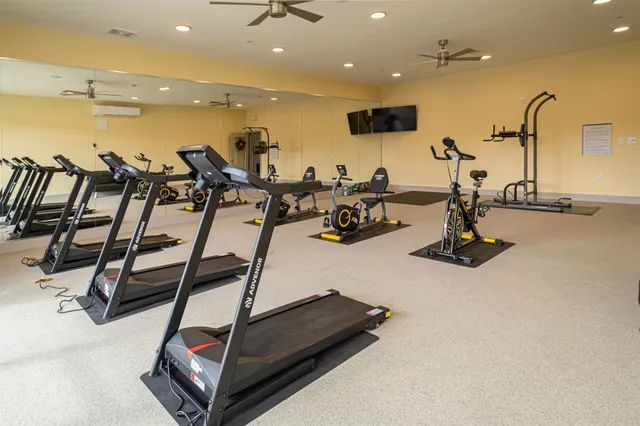 a view of a room with gym equipment
