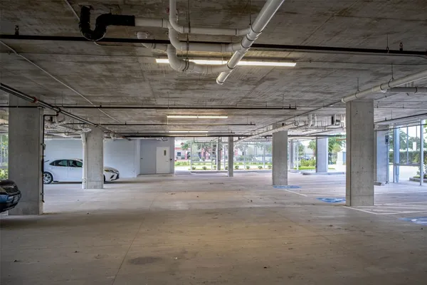 a view of an empty room with a fireplace