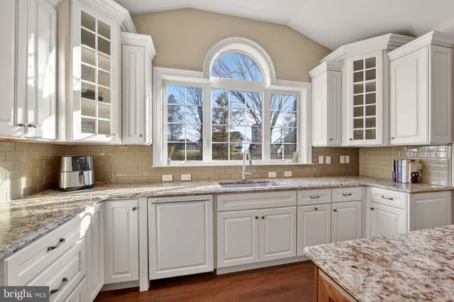 a bedroom with a bed and a cabinets