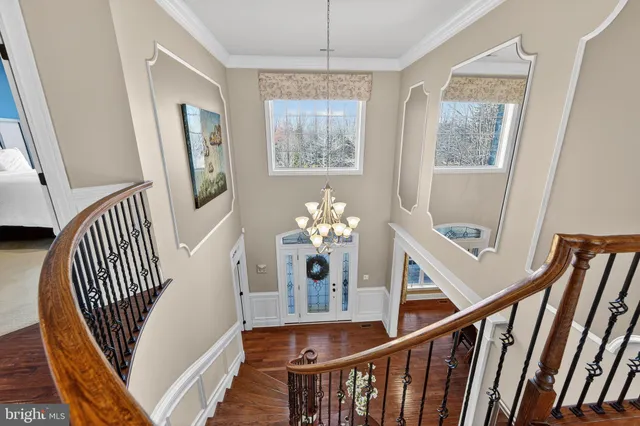 a bathroom with a double vanity sink mirror and shower