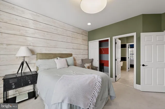 a view of a patio with iron fence