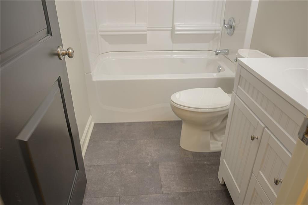 2392 Ridge Rd Extension Ambridge, PA 15003 - Photo 25 of 37 a bathroom with a sink and a toilet