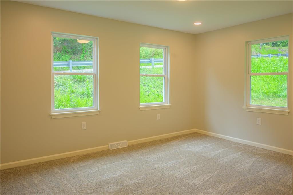 2392 Ridge Rd Extension Ambridge, PA 15003 - Photo 29 of 37 a view of an empty room with a window