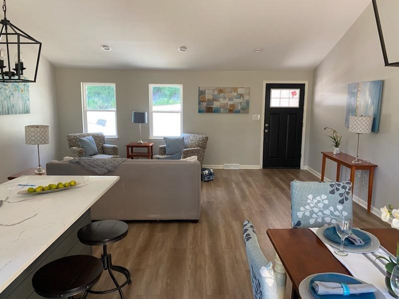 2392 Ridge Rd Extension Ambridge, PA 15003 - Photo 9 of 37 a living room with furniture and wooden floor