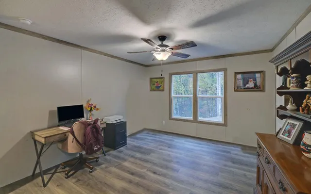 a view of a livingroom with furniture