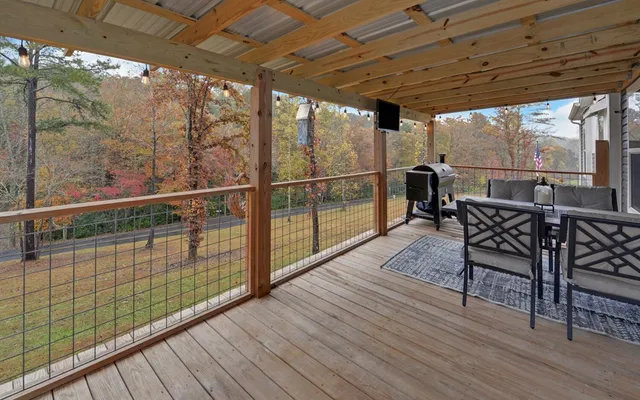 a view of a balcony with furniture
