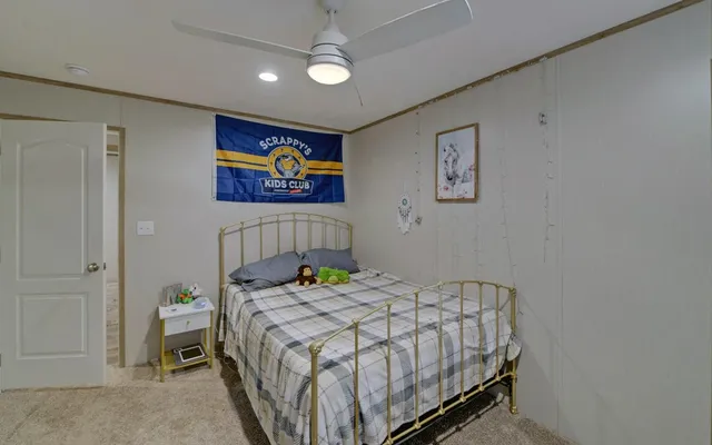a view of storage and utility room with washer and dryer