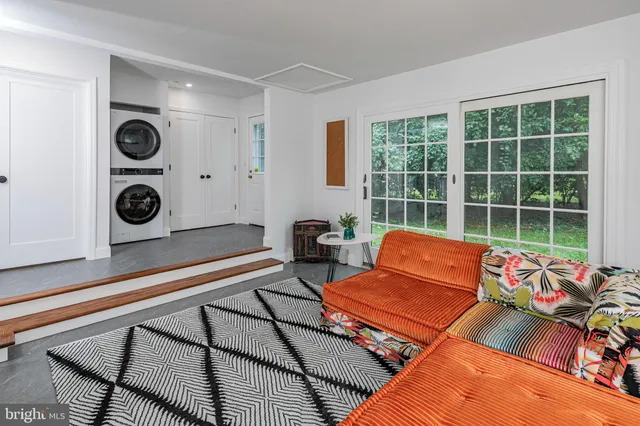 a room with furniture and a window