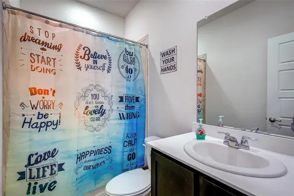 a view of a chairs and table on the deck