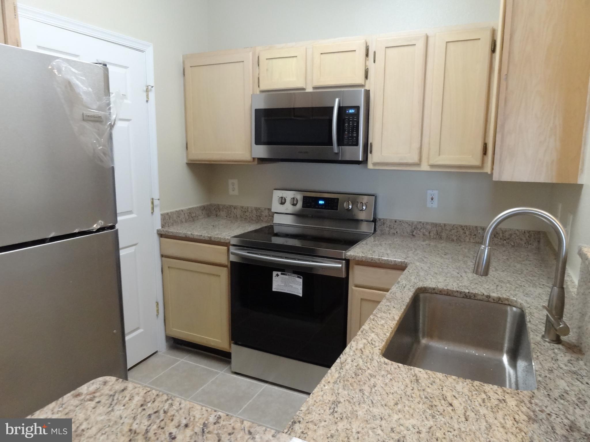 1591 Spring Gate Dr., Unit 3310 McLean, VA 22102 - Photo 2 of 31 Renovated kitchen