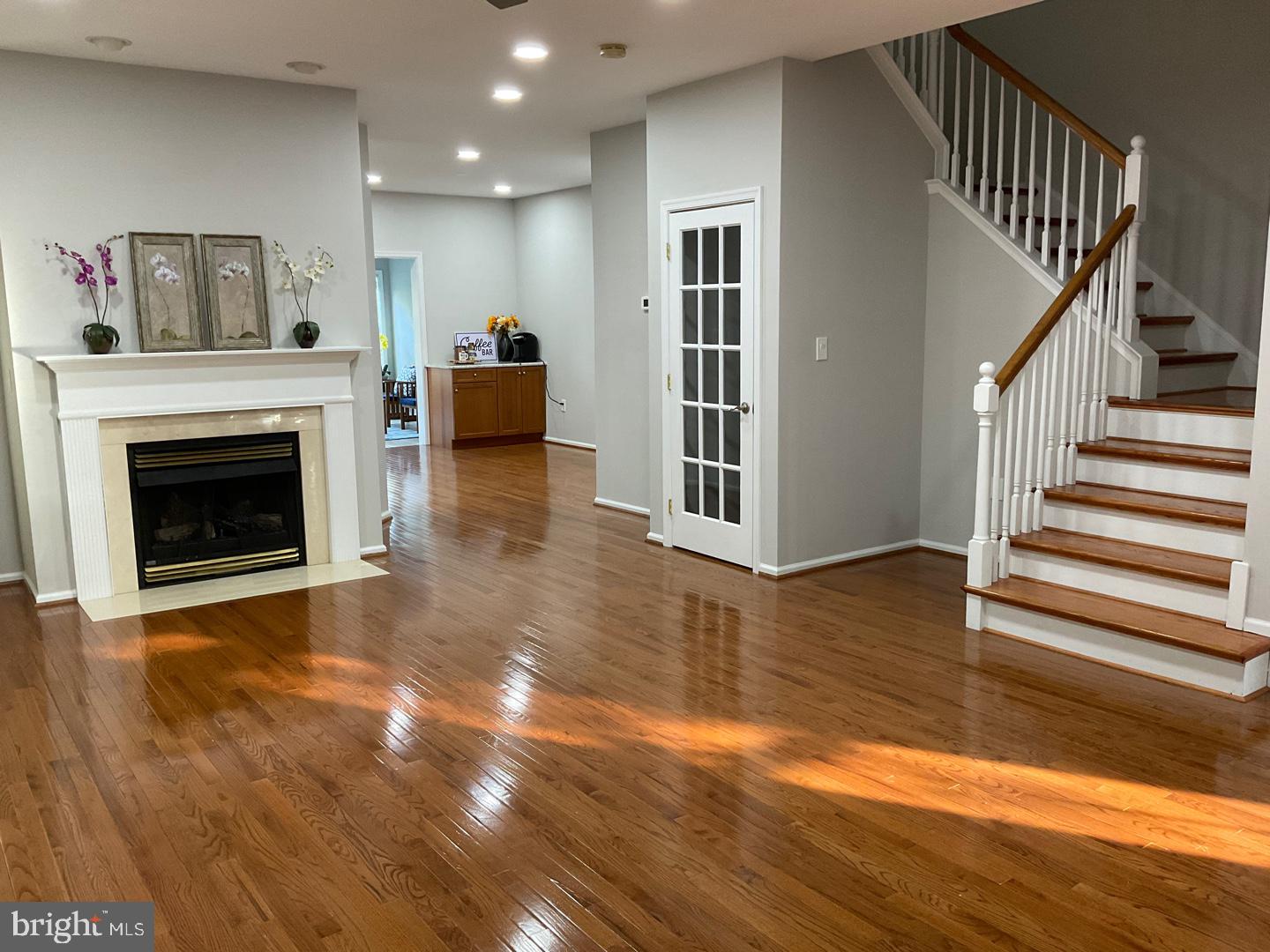 54 Arbor Circle Colmar, PA 18915 - Photo 11 of 74 a view of a livingroom with wooden floor and fireplace